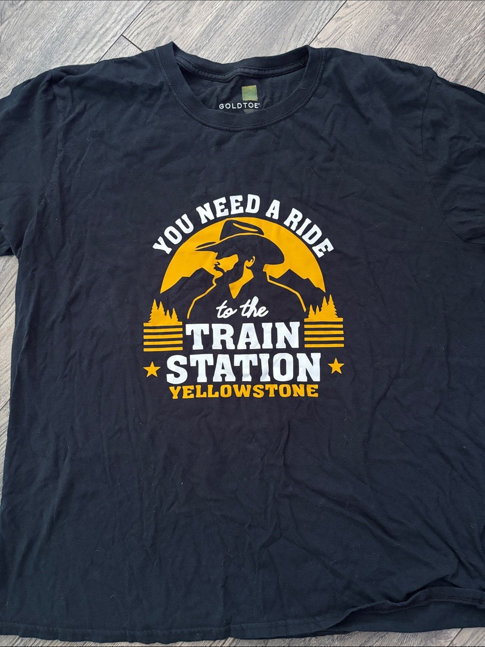 Gold Toe Black Tee with Yellow & White Yellowstone Train Station Graphic